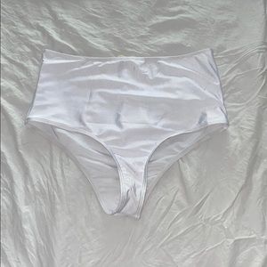 White rave booty shorts